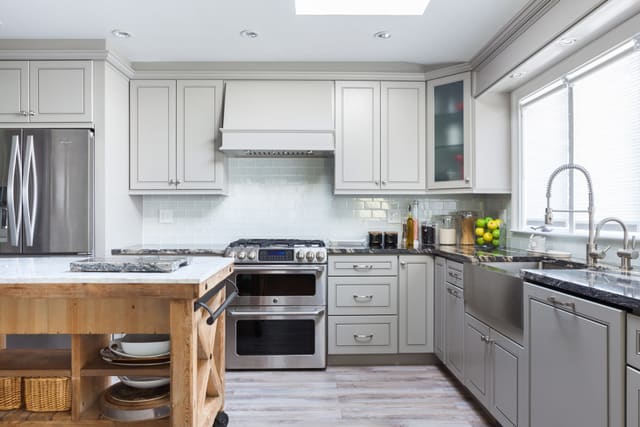 J&K K3 Greige kitchen with a center island