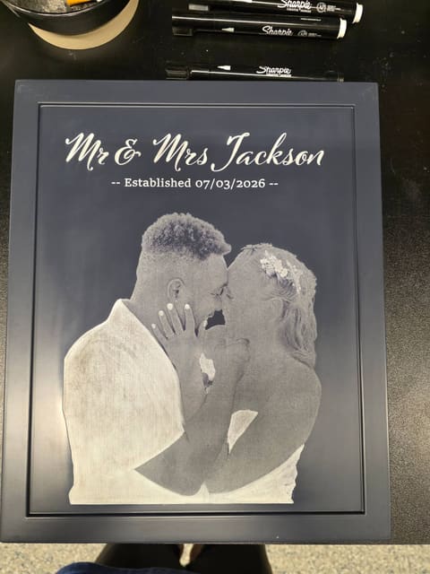 Navy cabinet door laser-etched with a couple's wedding photo and the words Mr & Mrs Jackson, Established 07/03/2026